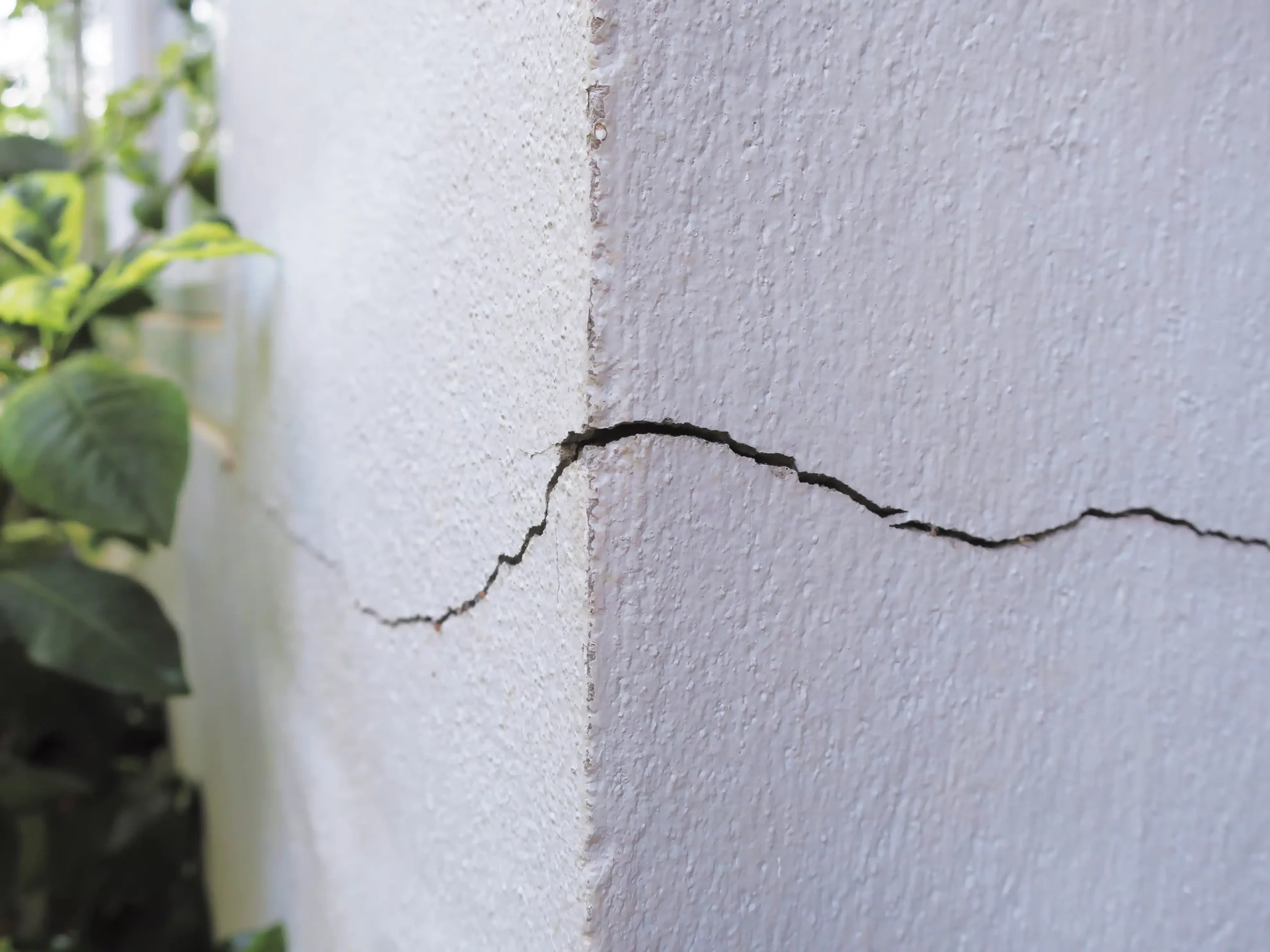How to fix a foundation crack - crack in outside of home's foundation