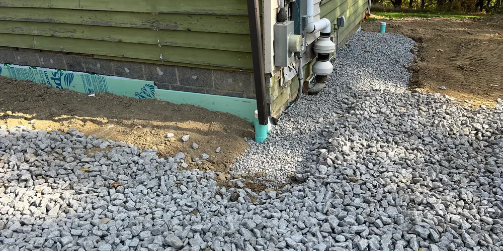 Exterior basement waterproofing and drainage systems
