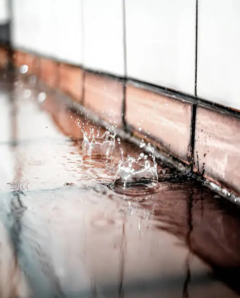 water coming through basement wall; leaking basement wall